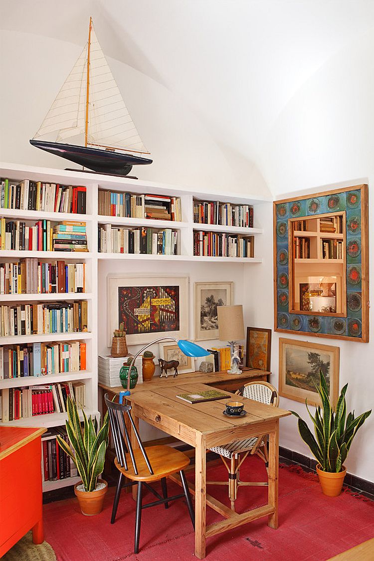 Smart shelving offers ample space for books and files in home office