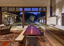 Sparkling-dining-area-and-living-zone-connected-with-the-landscape-outside-217x155