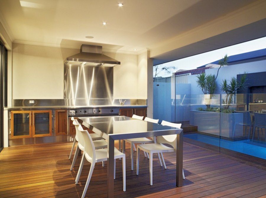 Stainless steel dining table in a modern kitchen