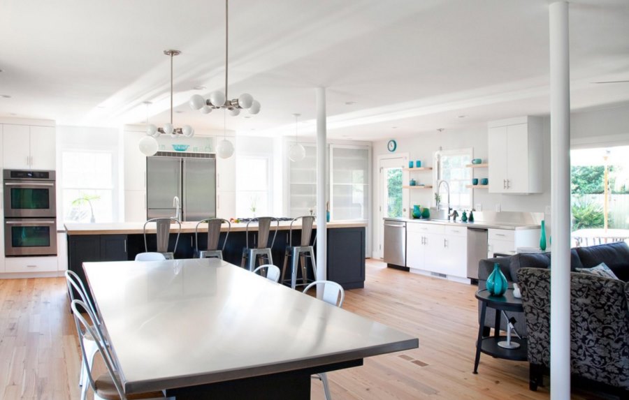 Stainless steel table in a light and airy dining space