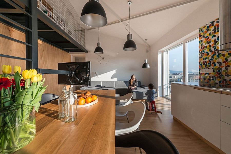 TV creates an optical boundary between kitchen and living area