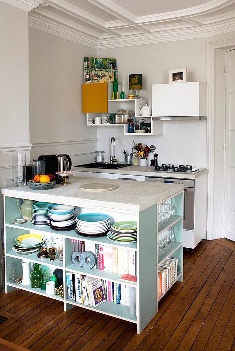 Tiny contemporary kitchen with island that features open shelving for smart storage [Design: Thibaut and Thewood]