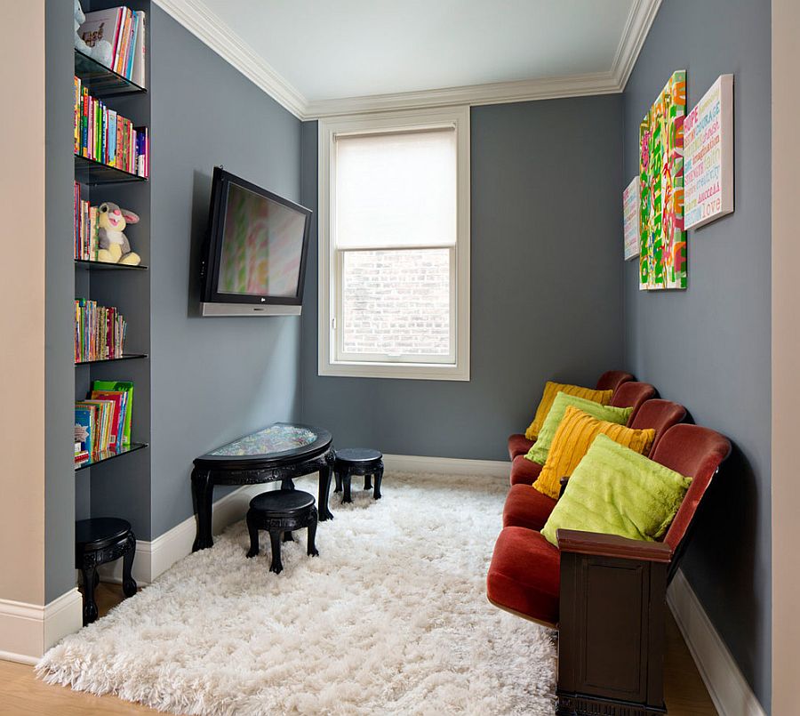 Tiny nook off of the hallway turned into kids' play zone and TV viewing space