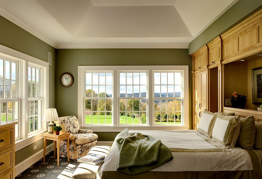 Traditional bedroom in green and white with large windows [Design: Crisp Architects]