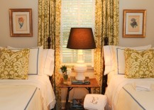 Twin-beds-in-small-guest-room-with-matching-curtains-and-pillows-217x155