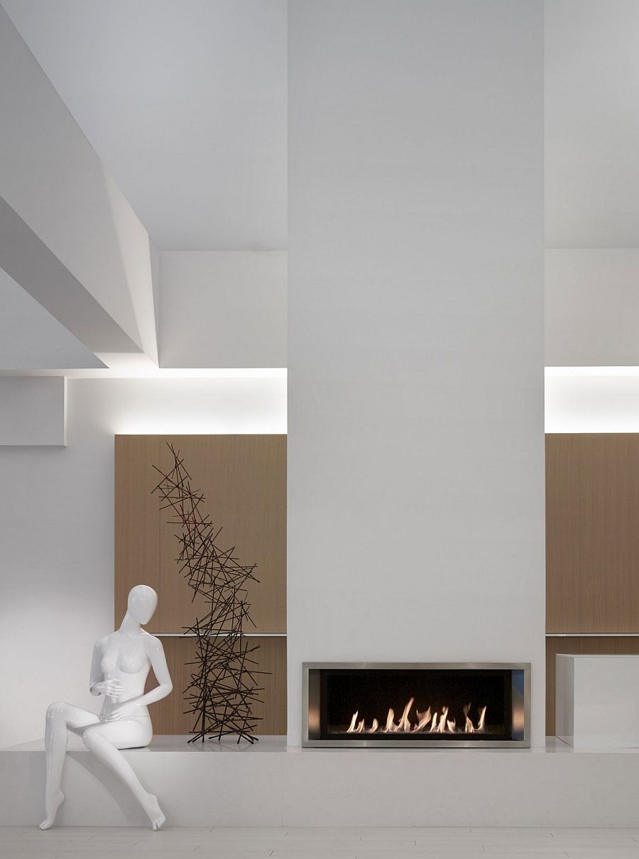 Two story fireplace with contemporary charm in pristine white