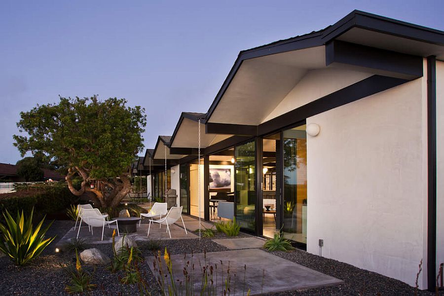 Unassuming patio design in gravel and concrete