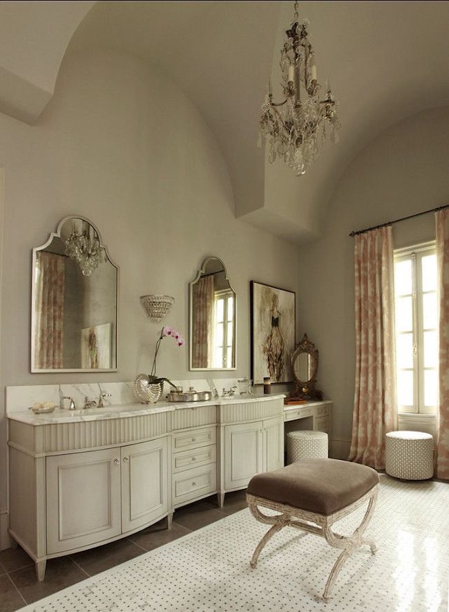 Upholstered vanity stool in elegant bathroom