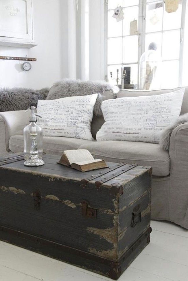 Very dark and weathered trunk used as coffee table