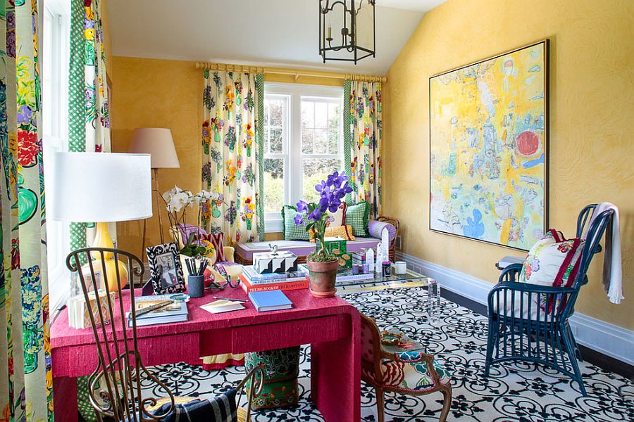 Walls in yellow bring texture and coziness to the eclectic home office full of color