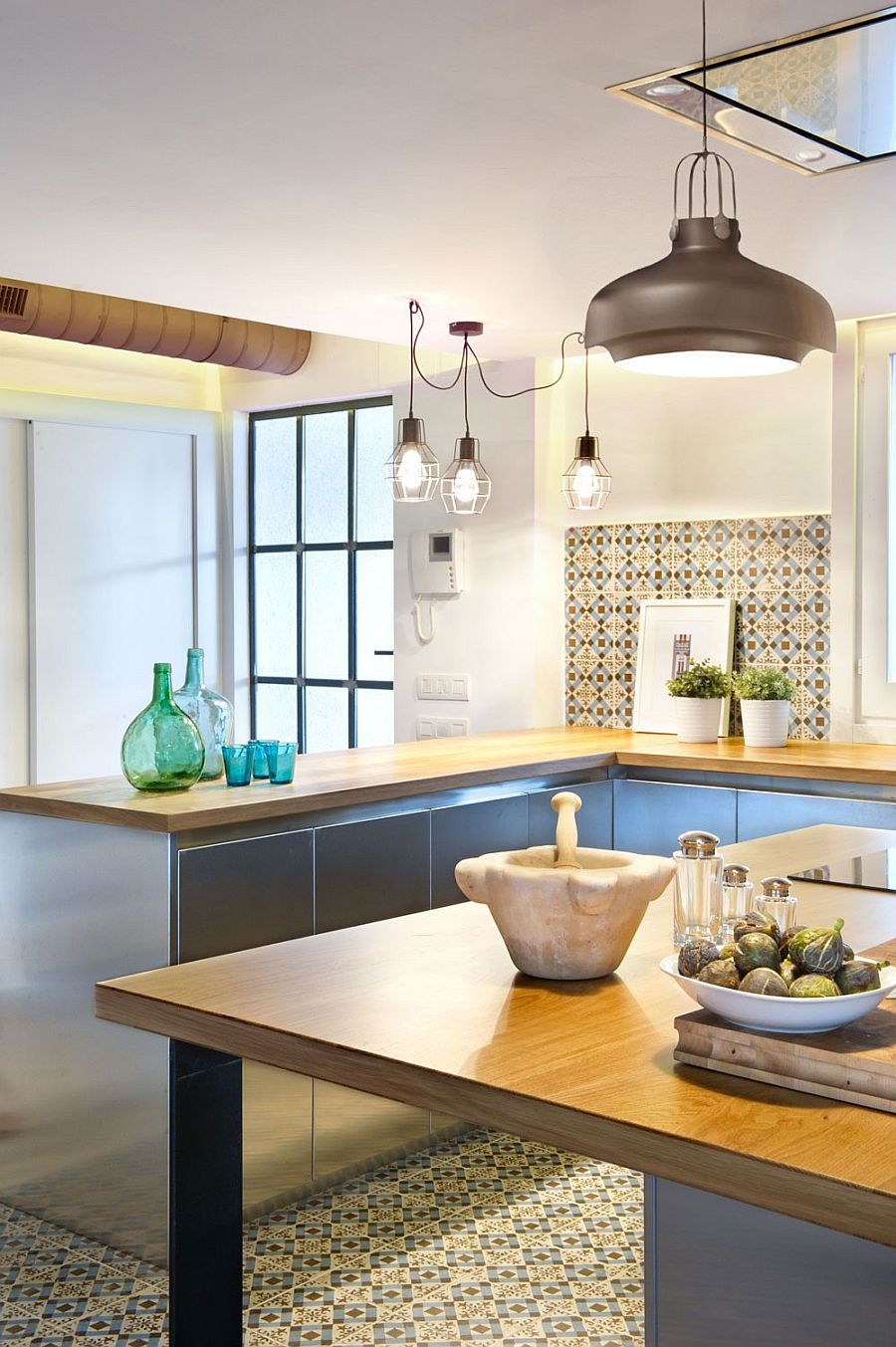 Wooden kitchen workstation and island with crisp industrial style