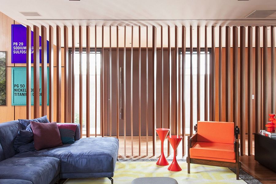 Woodens slats allow you to switch between privacy and connectivity in the TV room