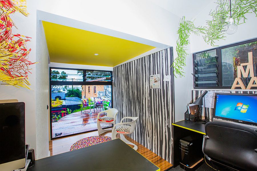 Yellow infuses electric charm to this snazzy home office