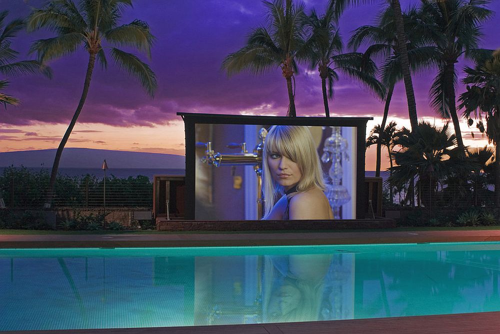 20-foot high-tech poolside screen with weather-sensitive features shapes a stunning outdoor theater