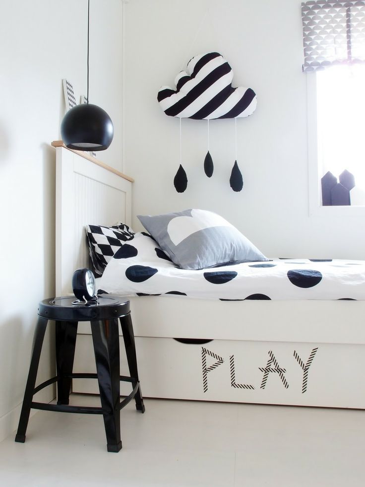 Adorable black and white rain cloud decor for a kids' bedroom