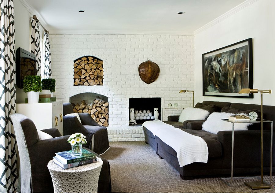 Antique additions in the fireplace add to the exclusivity of the media room [Design: Melanie Turner]