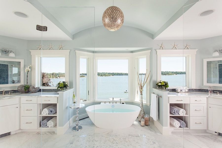 Beach style bathroom offers a relaxing dip and a fabulous view [Design: Roomscapes Luxury Design Center]