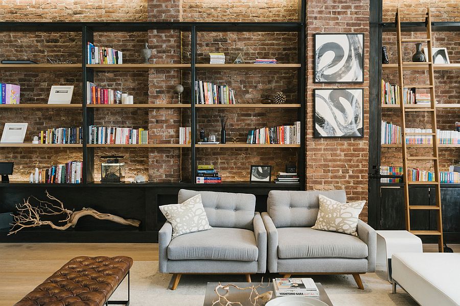 Beautiful bookshelves add to the industrial style of the living room [Design: Raad Studio]