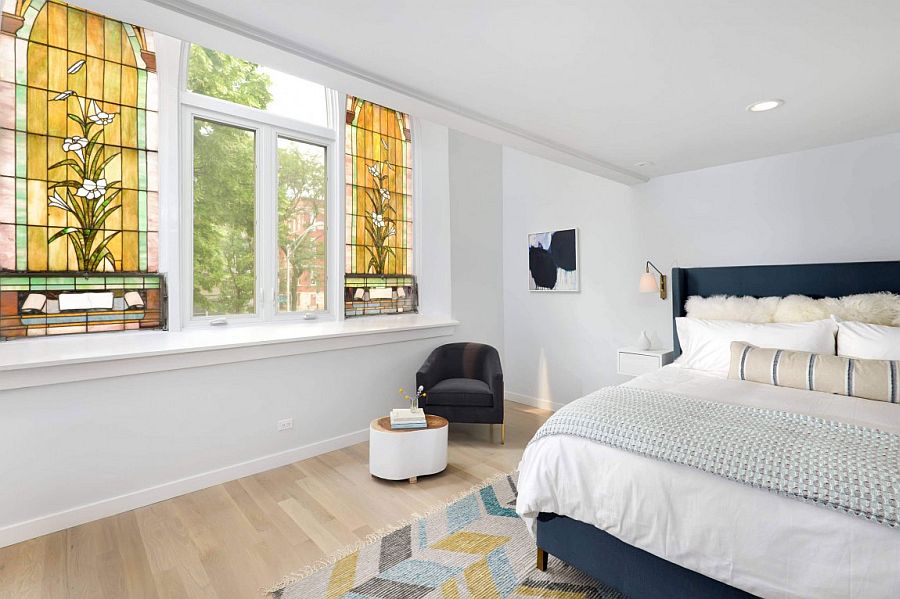 Beautiful modern bedroom with church windows that bring color and pattern