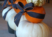 Beautiful-pumpkins-in-planters-with-ribbon-217x155