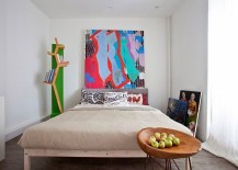 Bedroom-in-white-with-large-modern-art-piece-for-the-headboard-wall-217x155