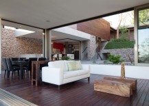 Breezy-and-beautiful-interiors-of-the-home-are-constantly-connected-with-the-central-garden-217x155
