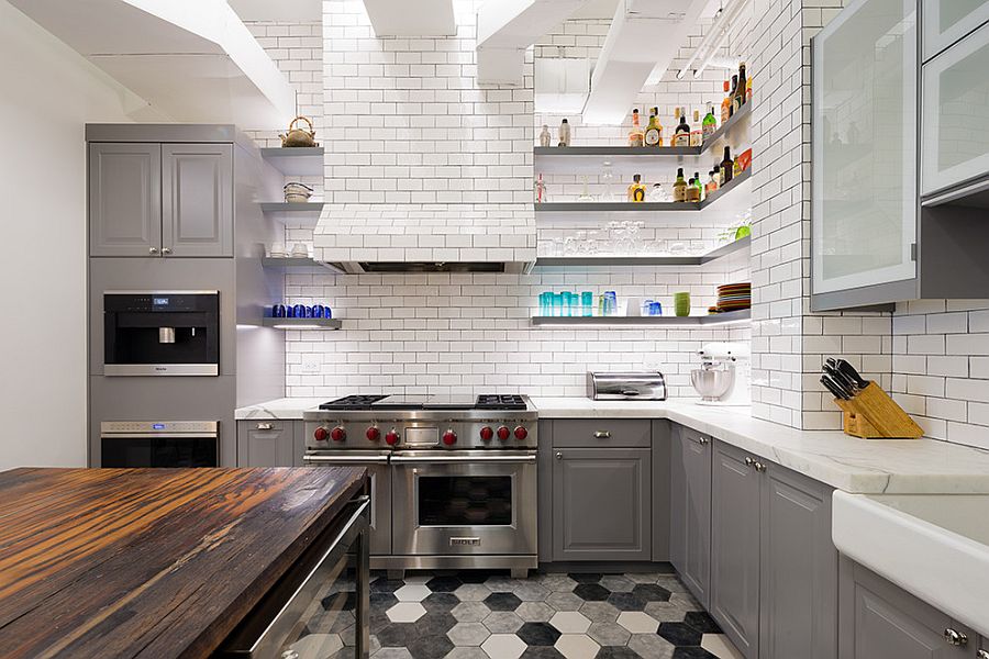 Brilliant lighting and hexagonal floor tiles make a big impact in this industrial kitchen