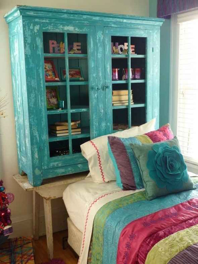 Cabinet turned bookshelf painted to match bedding