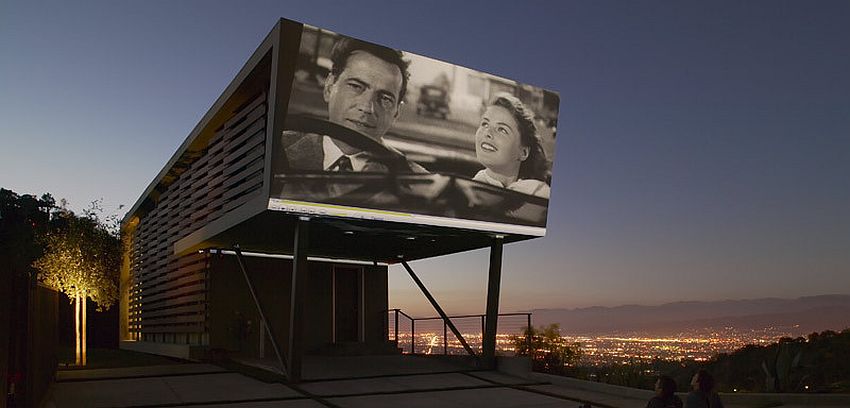 Carport overhang turned into a stunning projection screen [Design: Belzberg Architects]