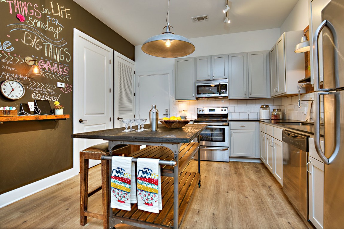 Chalkboard wall in the kitchen acts as a message board!