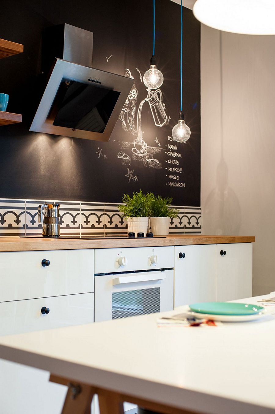 Chalkboard wall in the kitchen adds spunk to the interior