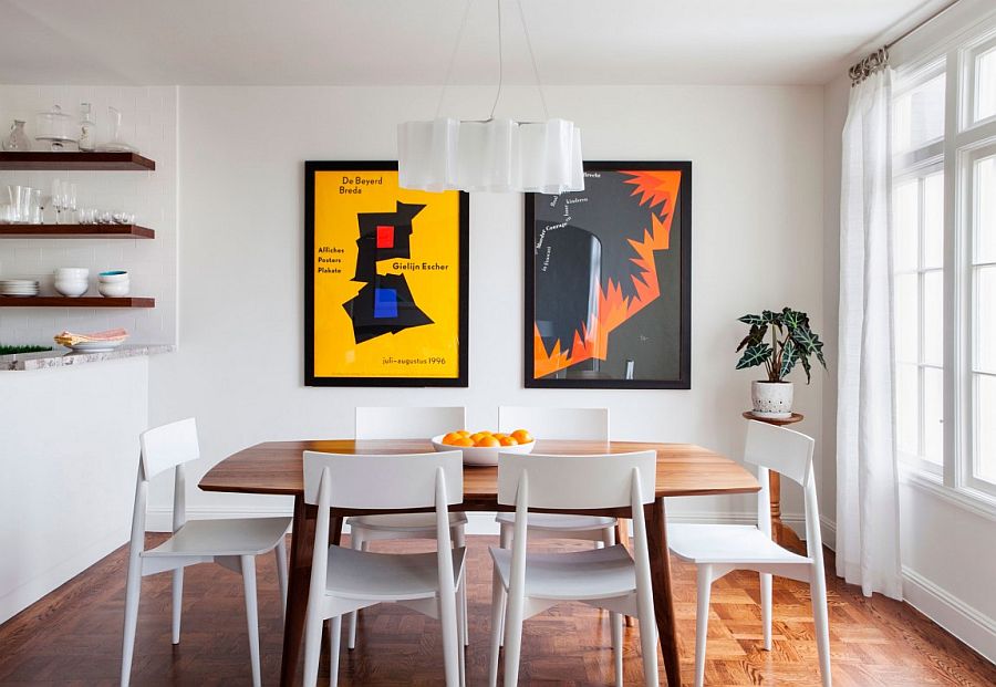 Cheerful dining room in white with Logico pendant and framed posters