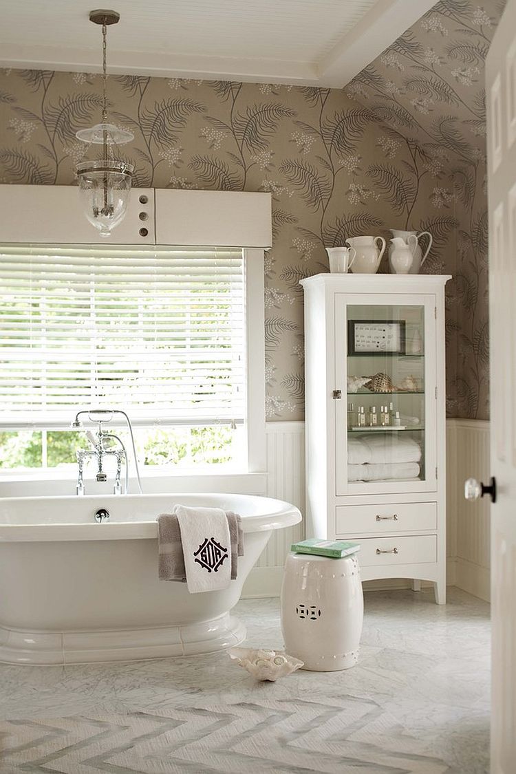 Chinese garden stool and vintage bathtub for the transitional bathroom