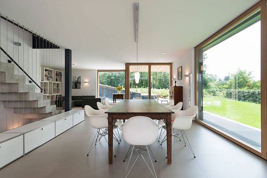 Classic Eames chairs at the dining table in wood