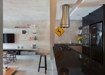 Color-and-daigonal-beam-divide-the-kitchen-from-the-living-area-217x155
