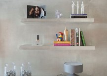 Concrete-floating-shelves-in-the-living-room-of-the-Ipanema-apartment-217x155