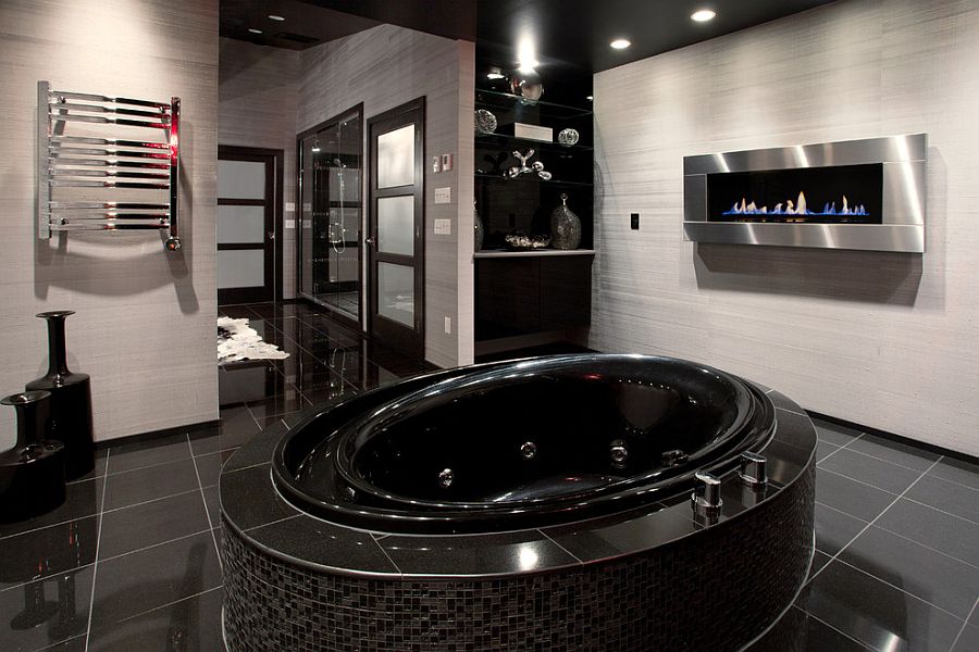 Contemporary bathroom with fireplace and a luxurious bathtub [Design: Lifespan Construction]