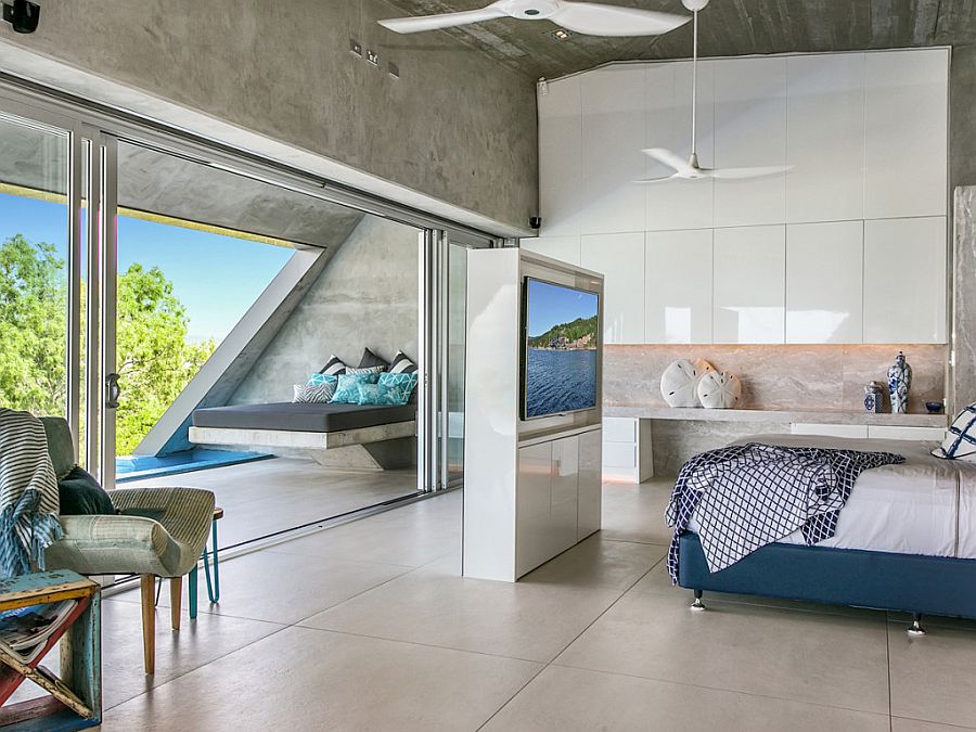 Contemporary bedroom with television wall and Ocean Views