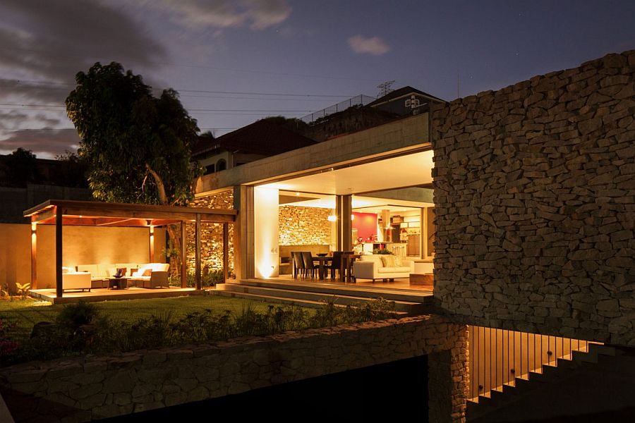 Contemporary home in El Salvador with stone and wood exterior