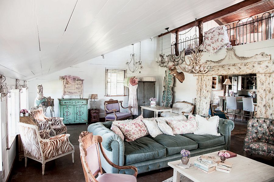 Cozy living room with slanted roof and vintage décor [Photography: Amy Neunsinger]