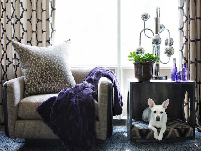 Crate/basket turned on one side for an easy table and dog bed