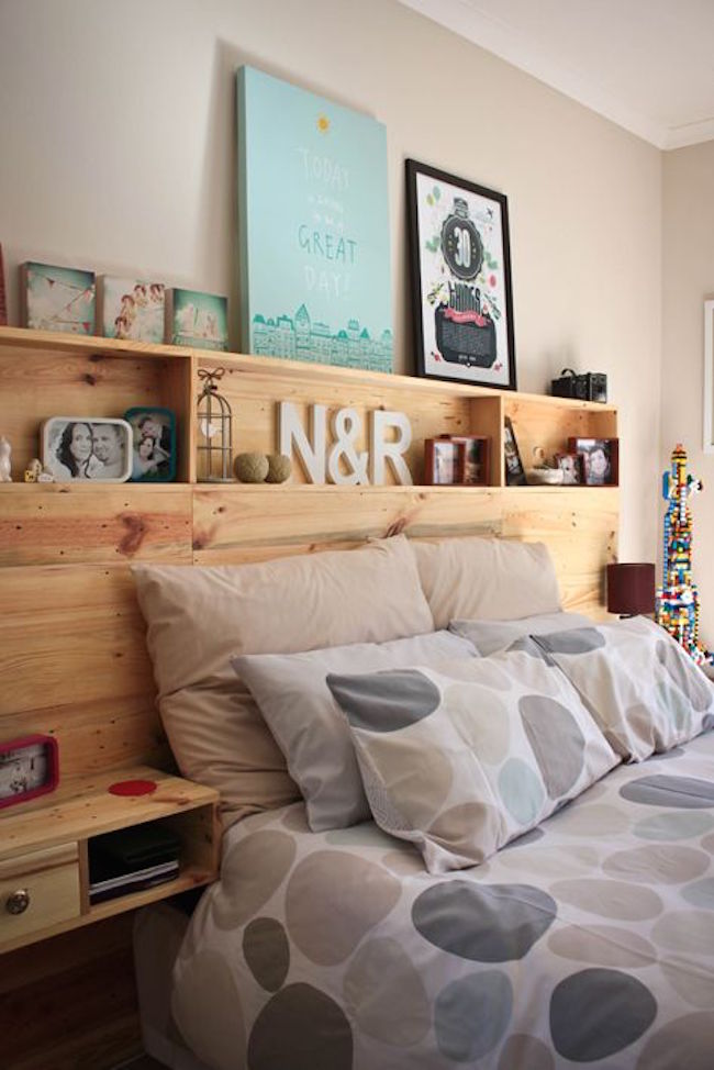 Custom pallet headboard with built-in side tables