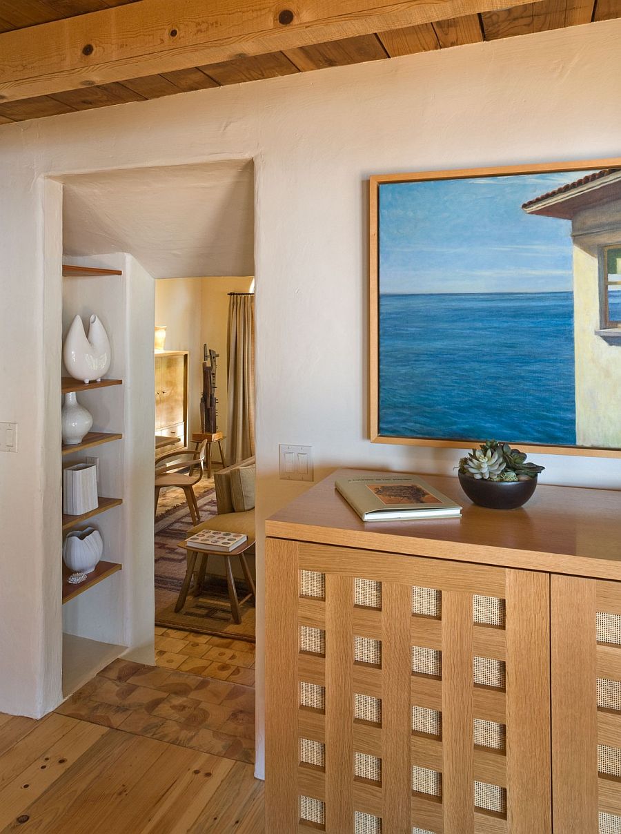 Decor and wall art add a subtle coastal touch to the interior