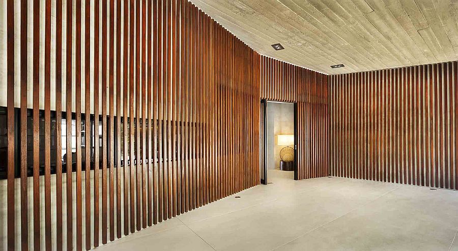 Entry of the home clad in wooden slats