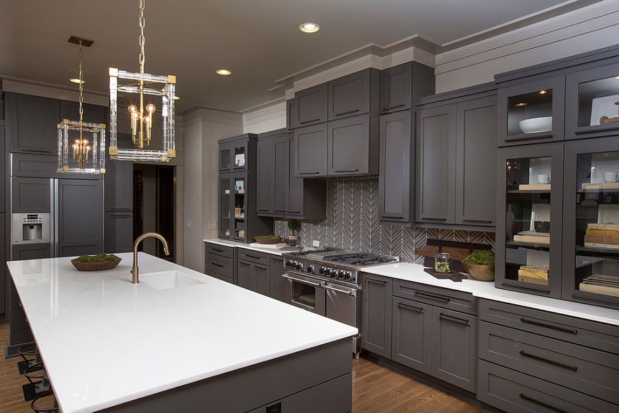 Exquisite gray kitchen with sparkling pendant lighting [Design: Romanelli & Hughes Custom Home Builders]