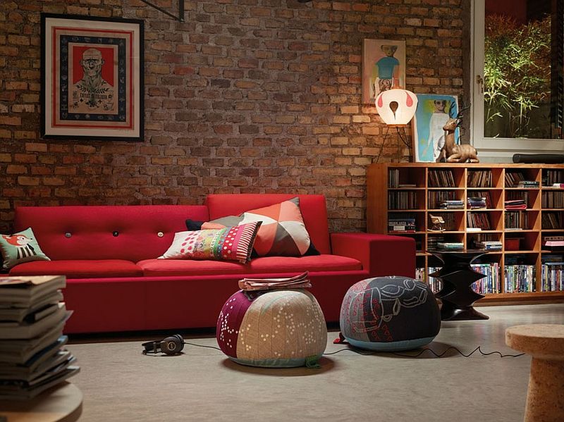 Exquisite red couch draws your eye in this living space