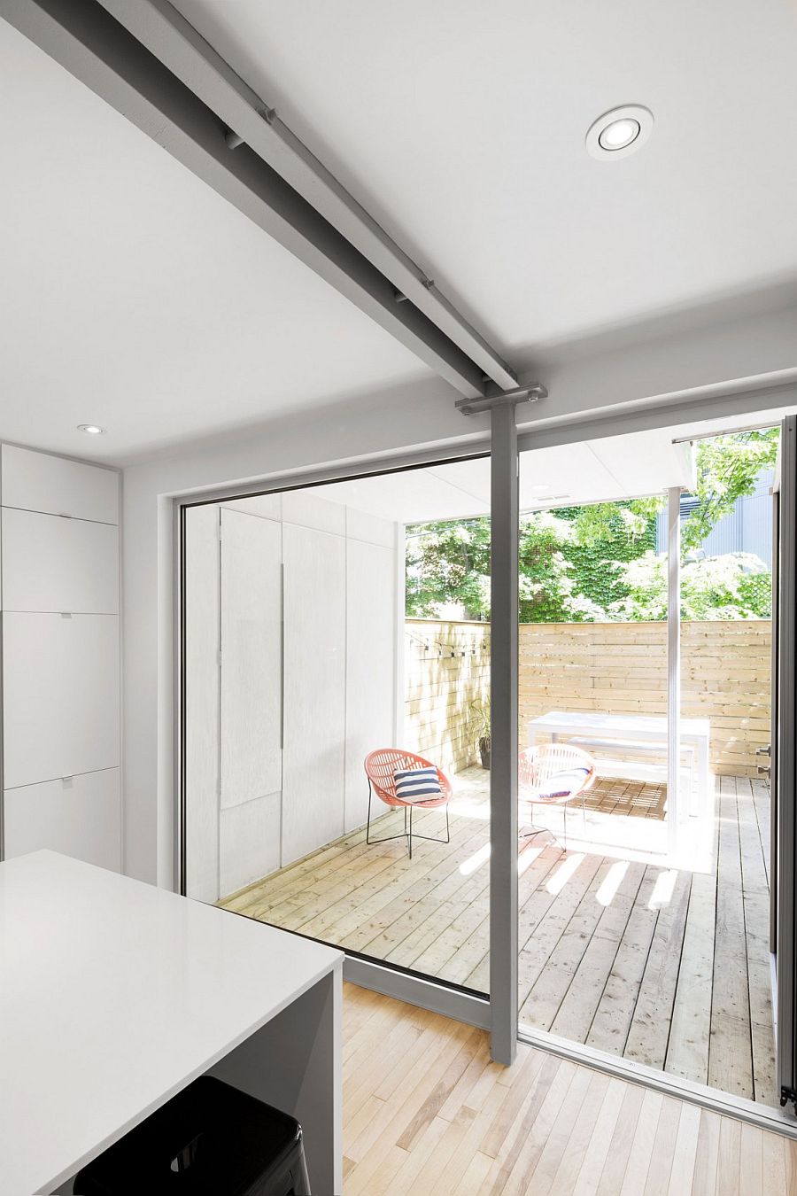 Exterior wooden deck of the home connected with the kitchen