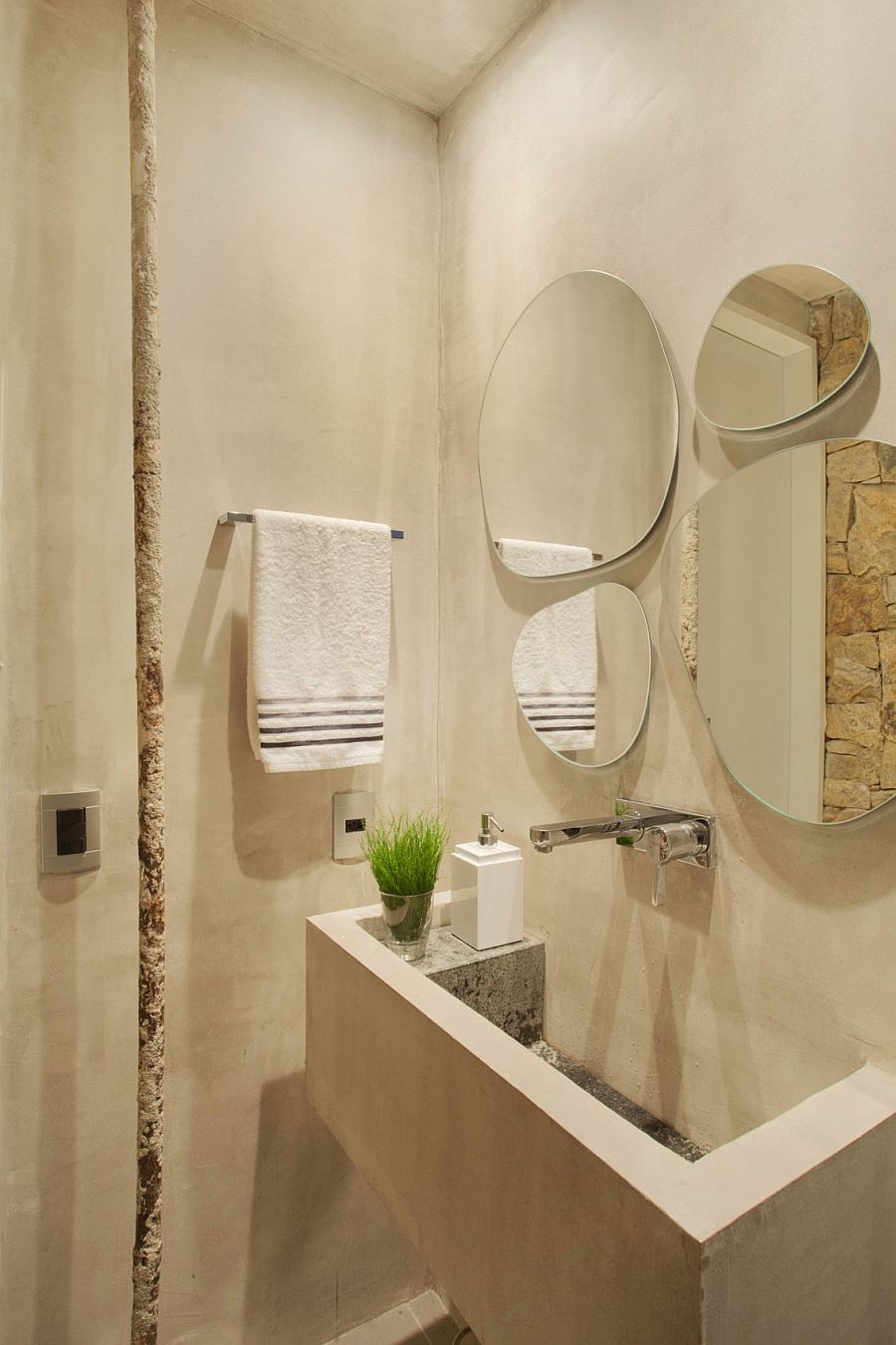 Fabulous collection of mirrors above the bathroom vanity