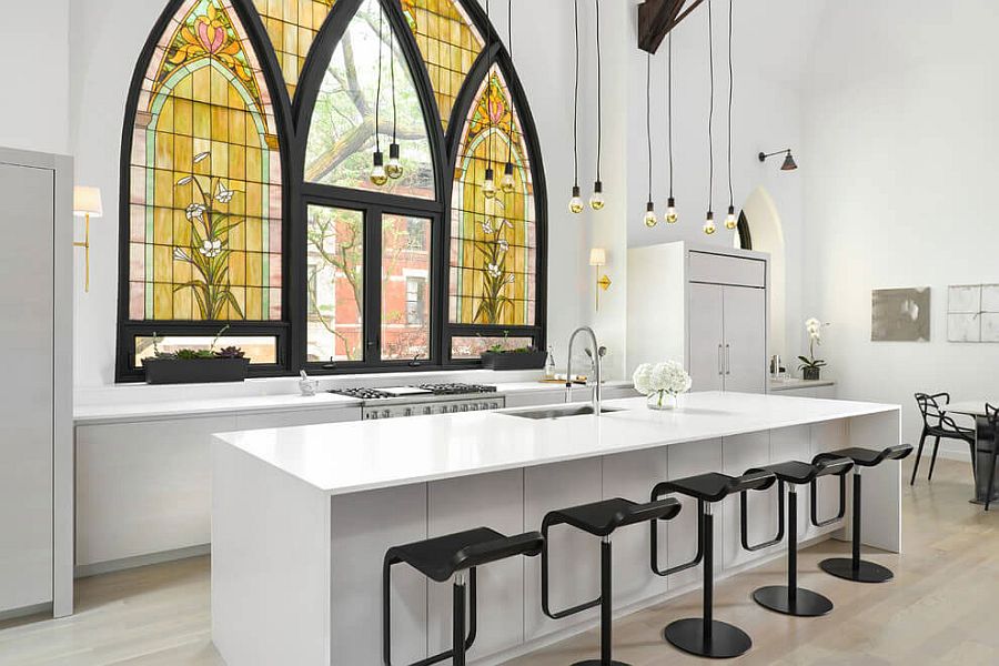 Fabulous modern kitchen in gray, white and black with beautiful stained glass church windows