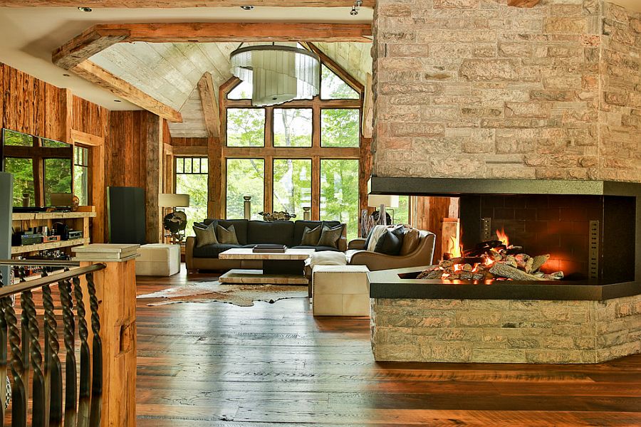 Family room with fireplace offers wonderful views of the lake and beyond